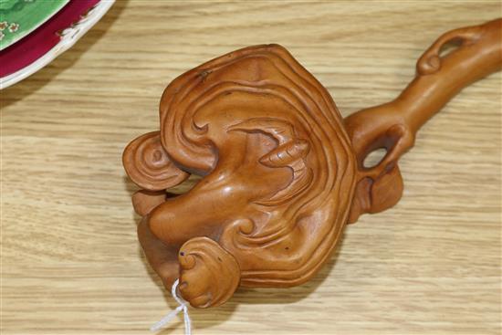 A Chinese wood ruyi sceptre, a Yixing teapot and a ceramic wall pocket ruyi sceptre length 47cm